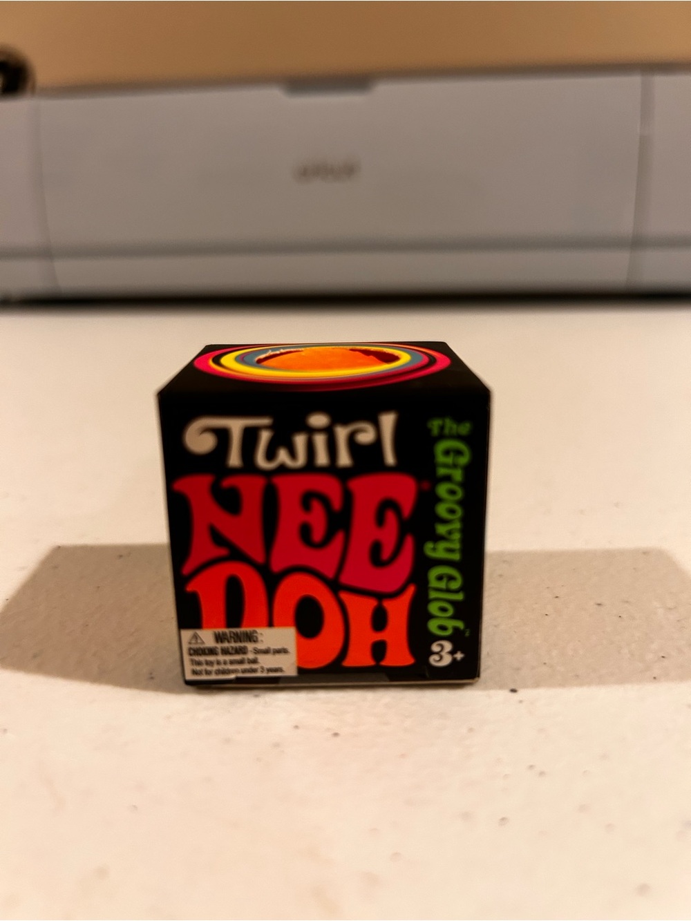 NEE DOH tiny twirl The Groovy Globe Fidget Toy -